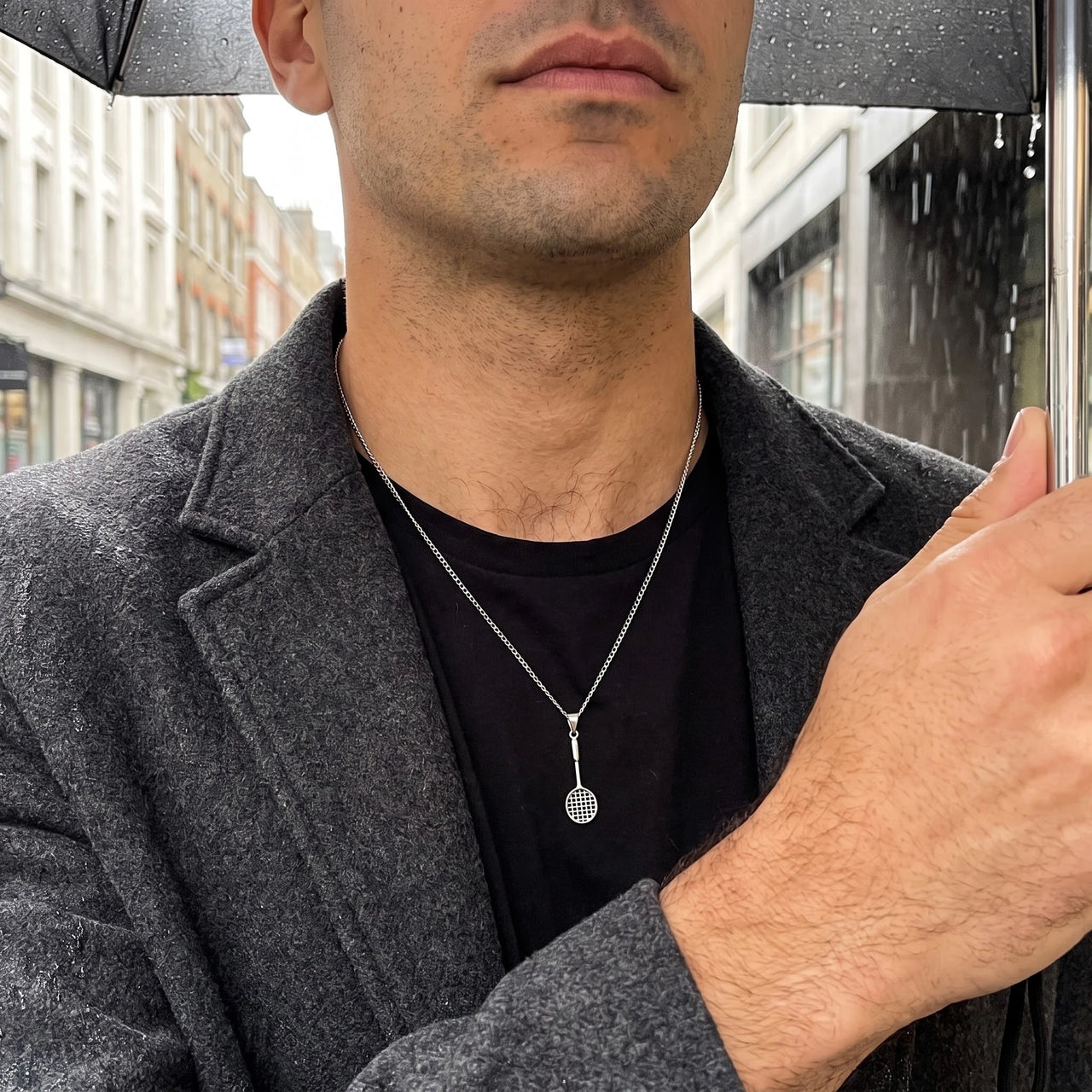 Badminton Racket Necklace Silver – worn by a man in the city | Brother & Sisters | SKU: White Gold