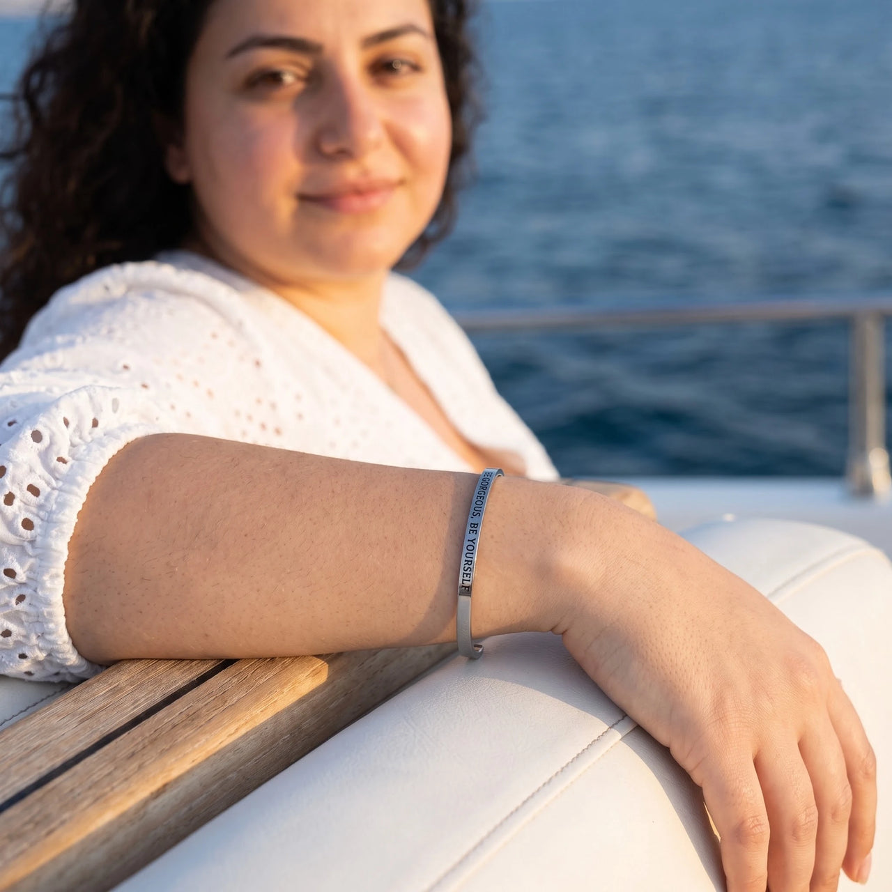 Be Gorgeous, Be Yourself bracelet in silver worn during a relaxed moment | SKU: bgby-wg