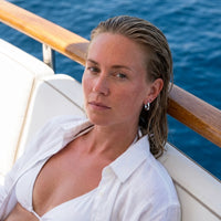 Thumbnail for Chunky Dome Hoops in Silver, worn on a yacht | SKU: 41005-silver