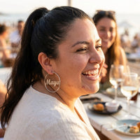 Thumbnail for Custom Name Hoop Earrings in Silver worn outdoors, lifestyle shot | SKU: name-hoop-silver-30-mm