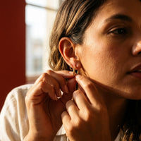 Thumbnail for Everyday Waterproof Hoops in Gold, being put on | SKU: 41001-gold