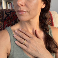Thumbnail for Woman gently touching her Hearts ring in gold | SKU: lescoeurs
