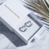 Thumbnail for Silver huggie hoop earrings in the Brother & Sisters gift box | SKU: 22023999-rhodium