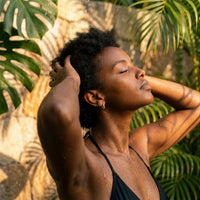 Thumbnail for Pave Huggie Hoop Earrings in Gold, worn in a tropical outdoor shower | SKU: 41011-gold