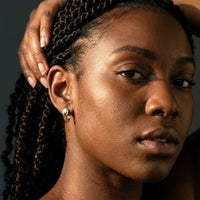 Thumbnail for Pear Crystal Huggie Hoops in Gold, studio portrait | SKU: 41007-gold