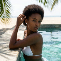 Thumbnail for Solitaire Crystal Studs in Silver, worn by a tropical pool | SKU: 41010-silver