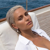 Thumbnail for Twisted Pearl Drop Hoops in Silver, worn on a yacht | SKU: 41004-silver